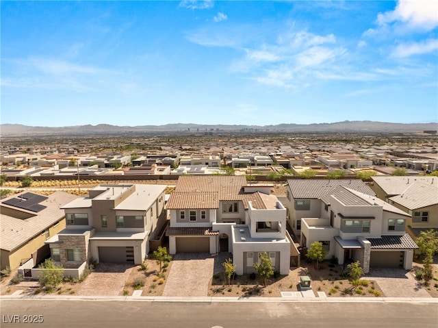 birds eye view of property featuring a residential view and a mountain view