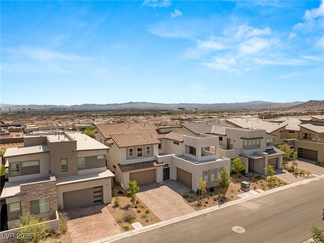 view of front of property with a mountain view