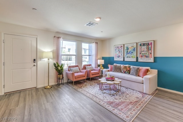 living room featuring hardwood / wood-style floors