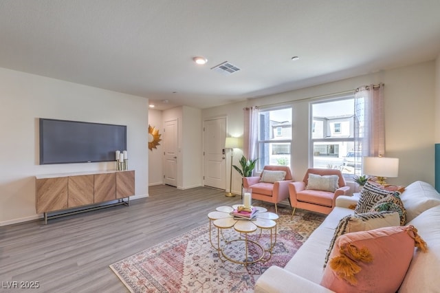 living room featuring light hardwood / wood-style flooring