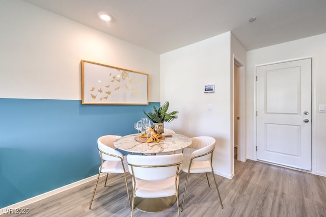 dining room featuring hardwood / wood-style flooring