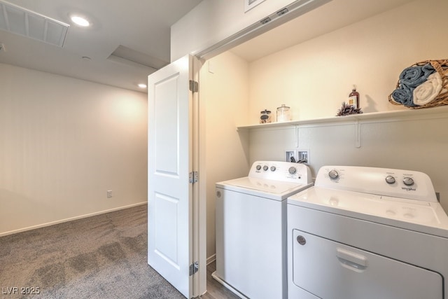 laundry area featuring separate washer and dryer and dark carpet