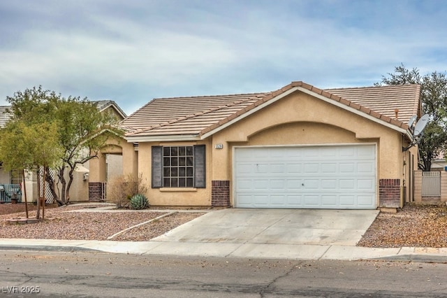 ranch-style home featuring a garage