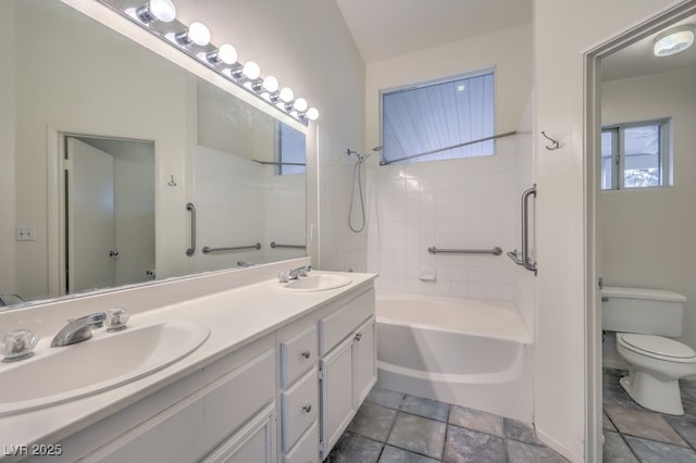 full bathroom featuring vanity, plus walk in shower, and toilet