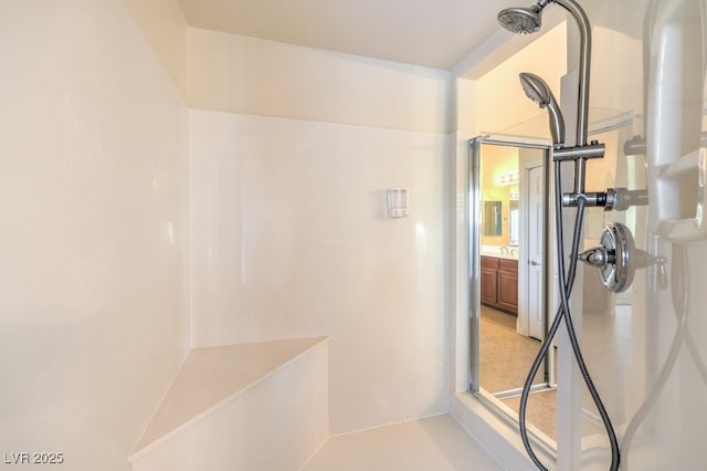 bathroom with vanity and walk in shower