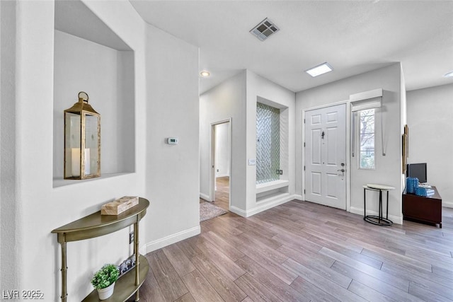 foyer featuring light hardwood / wood-style flooring