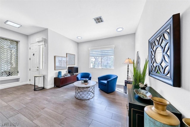 sitting room with light wood-type flooring