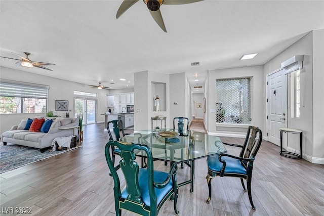 dining room featuring light hardwood / wood-style floors