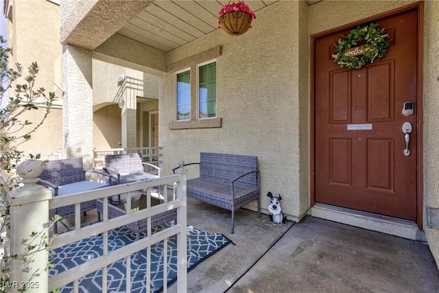 entrance to property with a porch