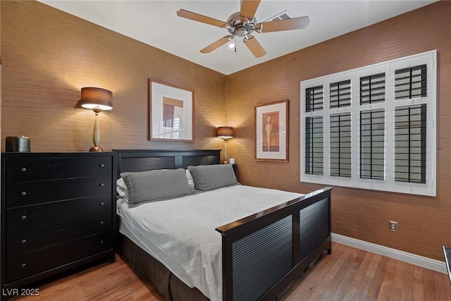 bedroom with light wood-type flooring