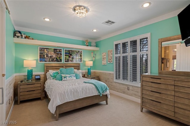 bedroom featuring light colored carpet