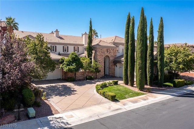 view of front of home with a garage