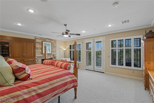 carpeted bedroom with access to outside, ornamental molding, french doors, and ceiling fan