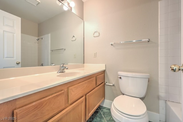 bathroom with tile patterned floors, vanity, and toilet