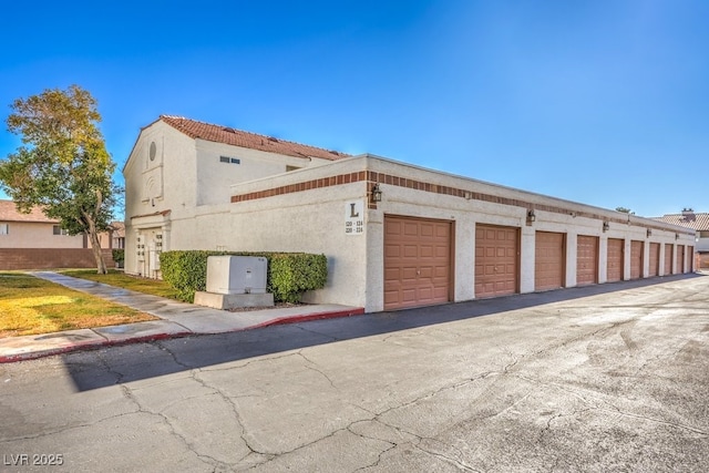 view of home's exterior featuring a garage