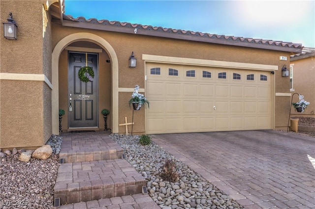 property entrance featuring a garage