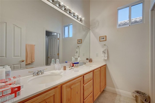 bathroom featuring vanity, plenty of natural light, and tile patterned floors