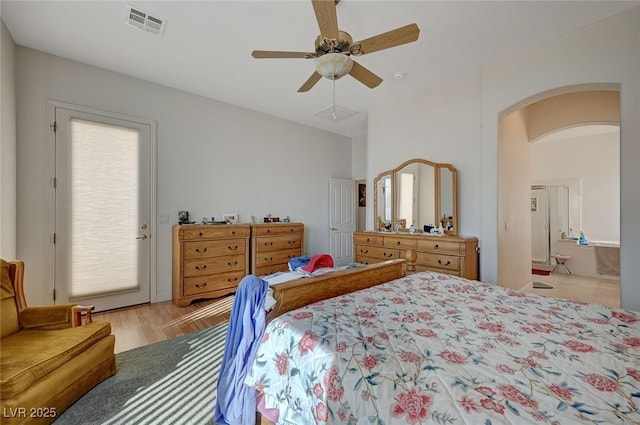 bedroom with access to exterior, light hardwood / wood-style floors, and ceiling fan