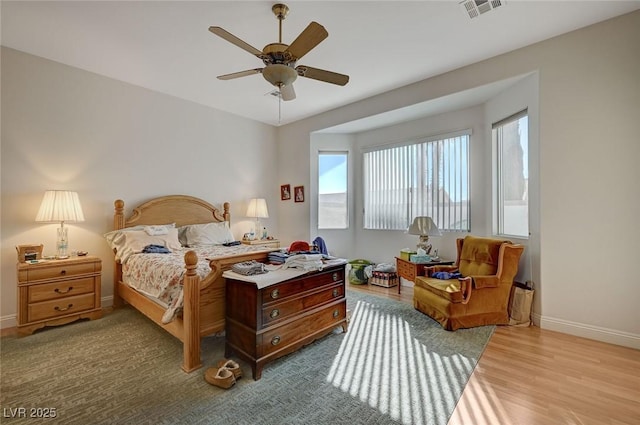 bedroom featuring ceiling fan and light wood-type flooring