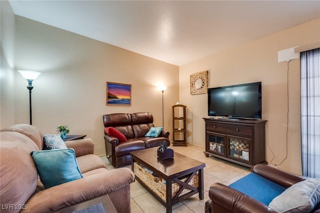 living room with light tile patterned flooring