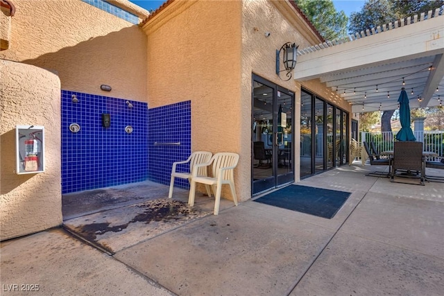 view of patio / terrace featuring a pergola