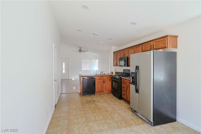 kitchen featuring black appliances, lofted ceiling, sink, ceiling fan, and kitchen peninsula