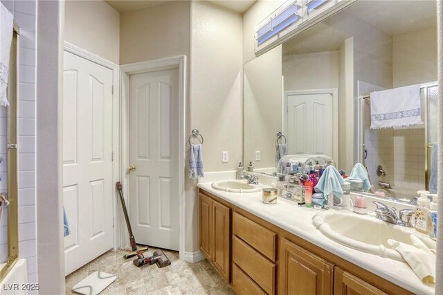 bathroom featuring vanity and shower / tub combination