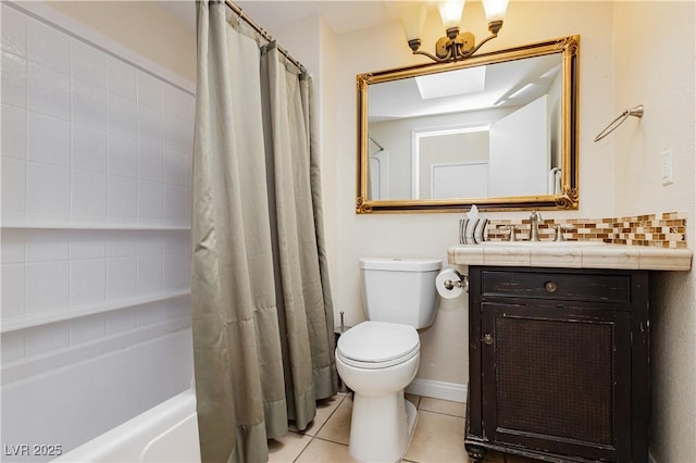 full bathroom with vanity, toilet, tile patterned flooring, and shower / bath combo with shower curtain