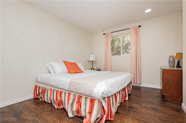 bedroom featuring dark hardwood / wood-style floors