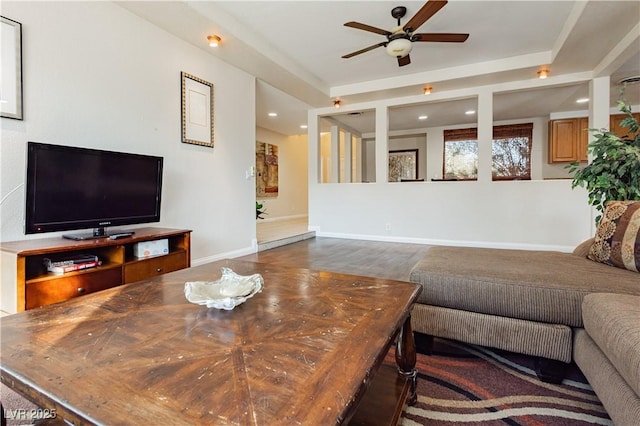 living room featuring ceiling fan