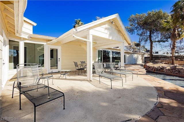 view of patio with a storage unit