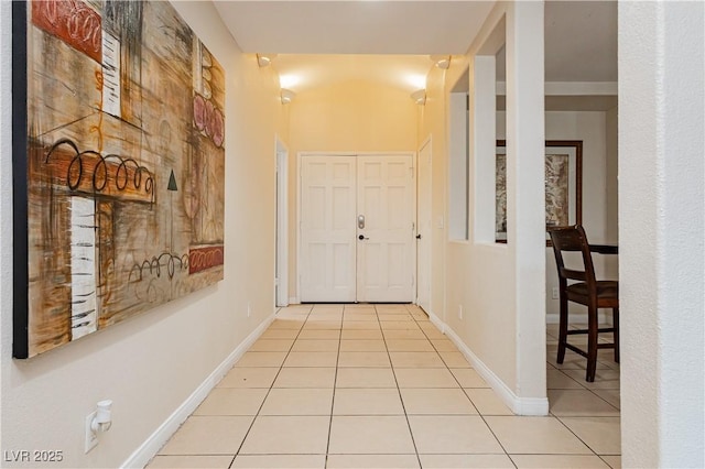 corridor featuring light tile patterned flooring