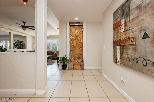 hallway featuring light tile patterned flooring