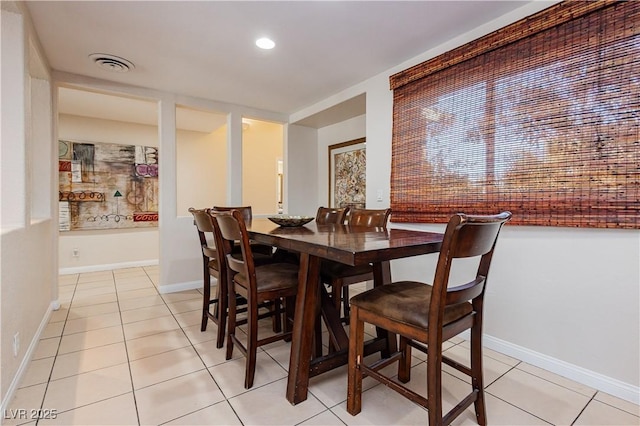 view of tiled dining space