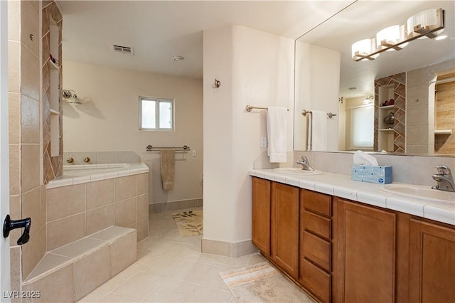 bathroom featuring vanity and tile patterned flooring