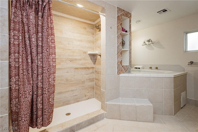 bathroom with tile patterned floors and a shower with shower curtain