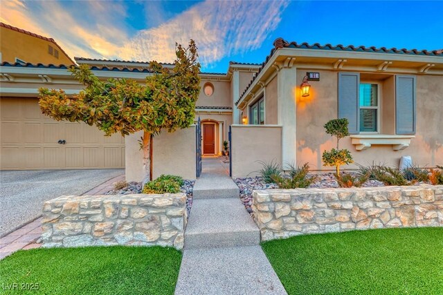 view of front of property with a garage