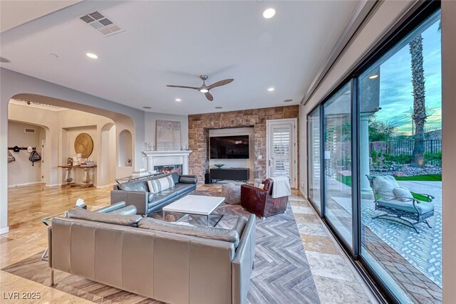 living room with ceiling fan