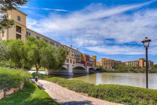 exterior space with a water view