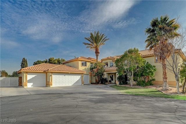 mediterranean / spanish-style house featuring a garage