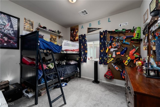 bedroom featuring light carpet