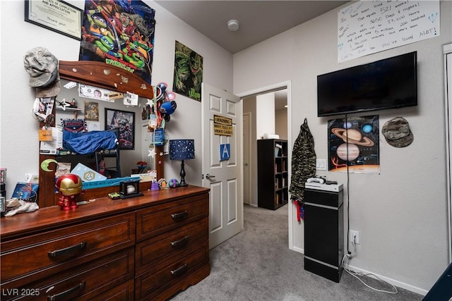 bedroom featuring light colored carpet