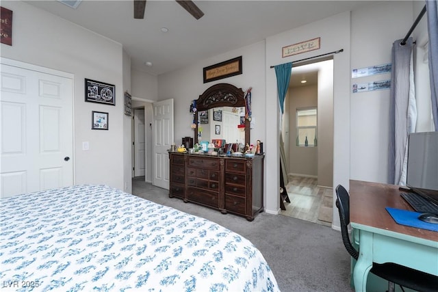 carpeted bedroom featuring ceiling fan