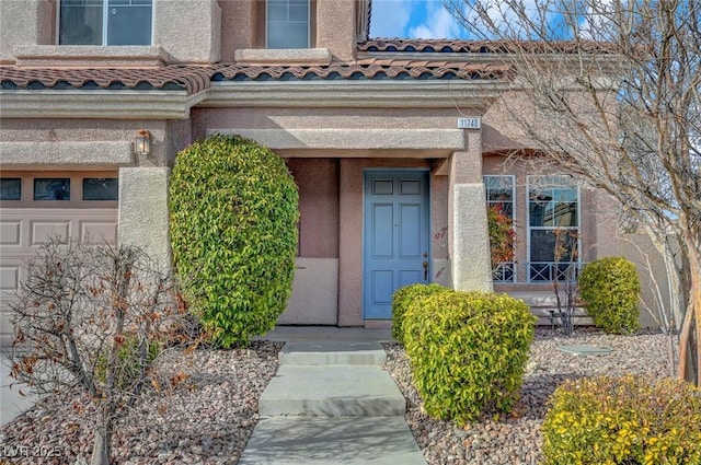 property entrance with a garage