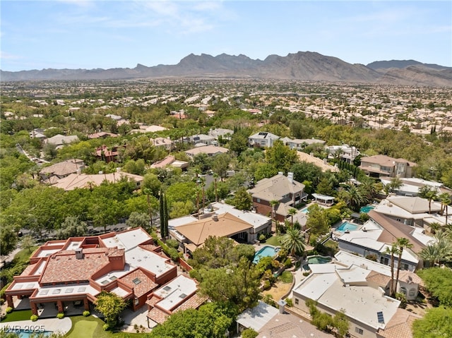 drone / aerial view featuring a mountain view