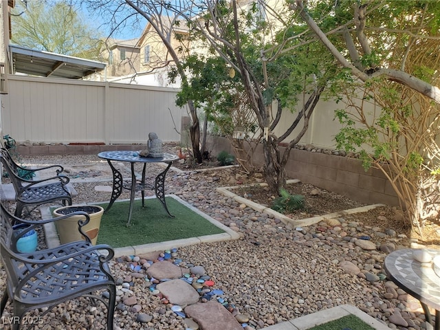 view of yard featuring a fenced backyard and a patio