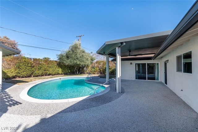 view of pool with a patio area