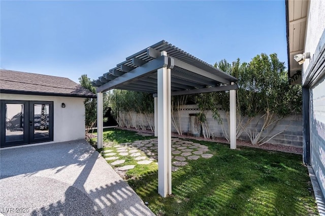 view of patio with french doors and a pergola