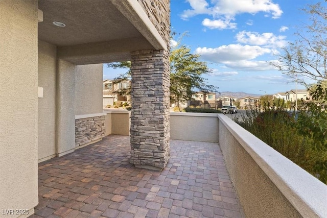 view of patio with a balcony