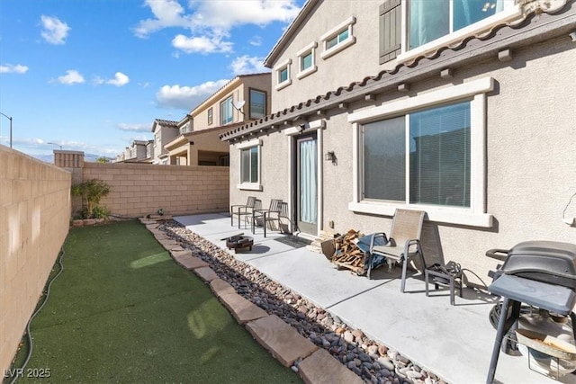 back of house with a patio area